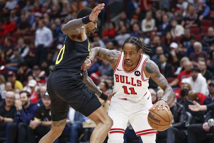 Chicago Bulls forward DeMar DeRozan (11) drives to the basket against Utah Jazz forward John Collins (20)